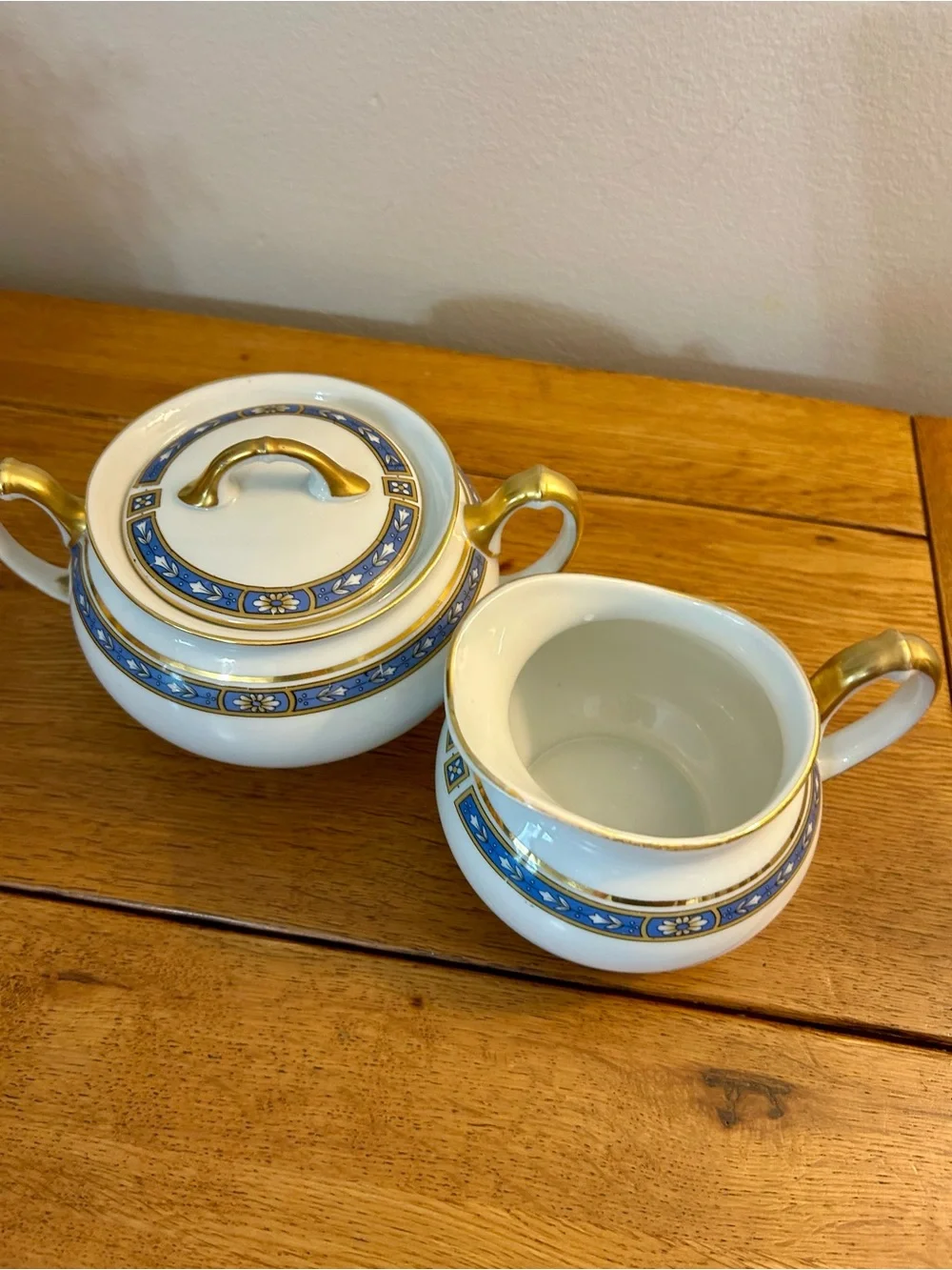 Vintage White Porcelain Sugar Bowl and Creamer Set with Blue